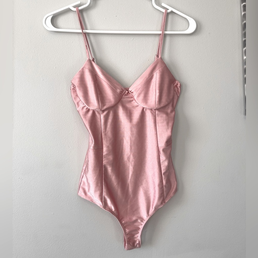 Pink silk body suit